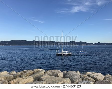 View From The Pier With Boats At The Distance In Sanxenxo Galicia Spain