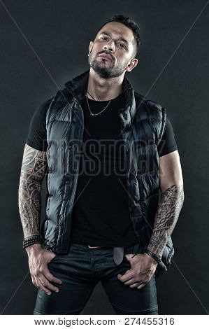 Man Brutal Unshaven Hispanic Appearance Tattooed Arms. Bearded Man Posing With Tattoos. Brutal Stric