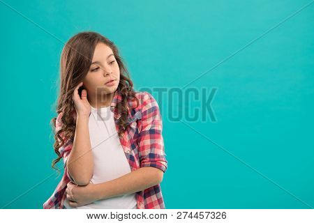 Daydreaming Concept. Kid Thoughtful Face Make Decision. Child Cute Curly Hair Thinking. Girl Casual 