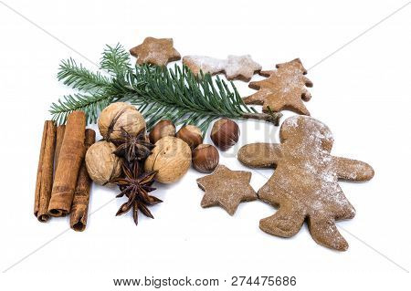 Christmas Cookies And Gingerbread With Fir Tree Branch Cinnamon Anise And Nuts