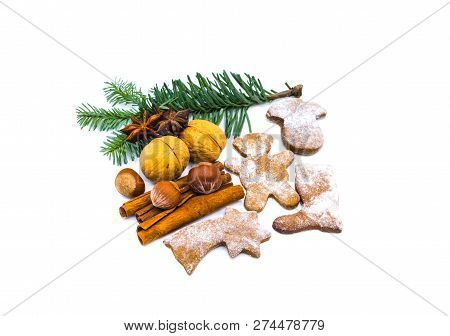 Christmas Decoration Cookies Nuts And Fir Branch Isolated On White Background