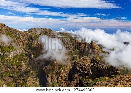 Hiking Pico do Arierio and Pico Ruivo - Madeira Portugal - travel background
