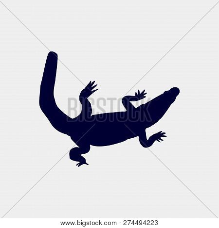 Vector Silhouette Of A Crocadile On A White Background.