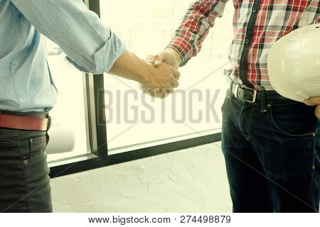 Architect Or Engineer  Handshake For Teamwork