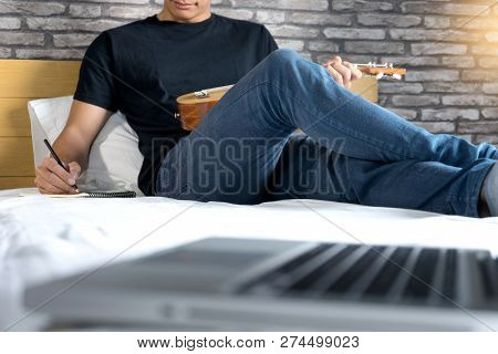 Young Man Write A Song Or Music