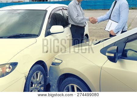 On The Road Car Accident Insurance Agent Examining Carcrash