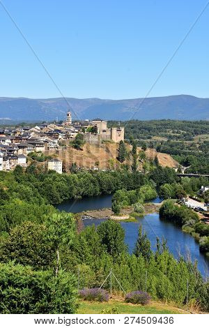 Elevated View Of The Medieval Town Of Puebla De Sanabria And The River Tera, Zamora Province, Castil