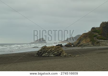 Beautiful Rock In The Center Of Los Quebrantos Beach On A Rainy Day. July 30, 2015. Landscapes, Natu