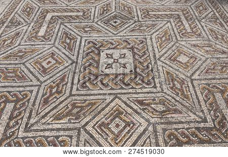 Geometric Mosaic Of The Roman Ruins Of The Ancient City Of Conimbriga, Beiras Region, Portugal