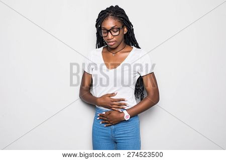 Woman With Stomach Abdomen Pain Having Bad Aches Isolated On White Background. Face Expression