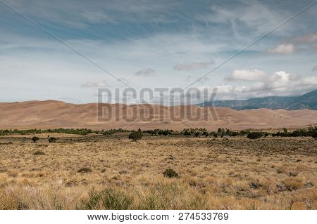 A View Of Giant Desert Sand Dunes In Great Sand Dunes National Park In Colorado, Usa