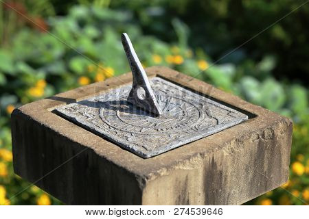 Mid-range Picture Of A Stone Outdoor Sundial