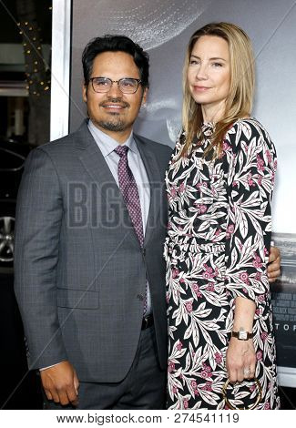 Michael Pena and Brie Shaffer at the World premiere of 'The Mule' held at the Regency Village Theatre in Westwood, USA on December 10, 2018.