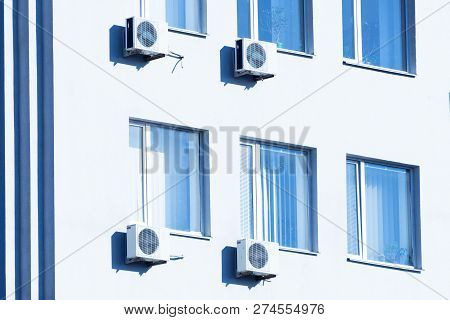 Air Conditioners On The Wall Of The Building, Airing The Room, Cooling The Air In Hot Weather