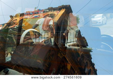 Abstract Urban Image Of Steet Of Kolkata - Reflection Of A Rickshaw Puller Pulling A Rikshaw, An Old