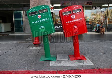 Taipei, Taiwan - December 4, 2018: Mailboxes Bent During Typhoon In Taipei, Taiwan. The Twisted Mail