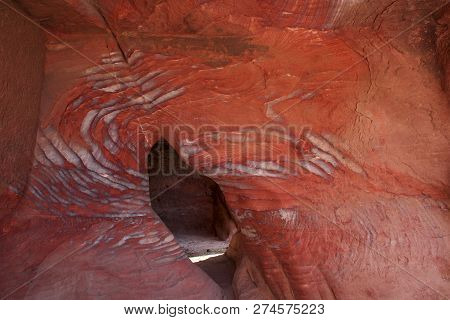 The Multi-colored Exposed Sandstone Rock And Mineral Layers Inside The Ancient Tombs Of Petra, Jorda