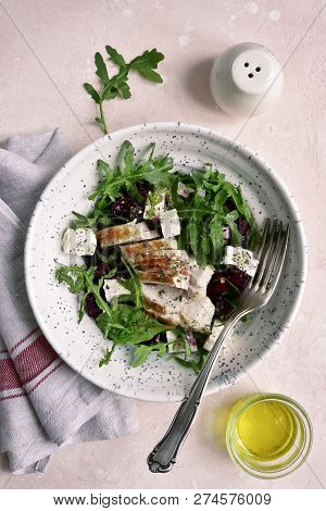 Beetroot Salad With Arugula, Grilled Chicken Fillet And Feta Cheese.top View With Copy Space.