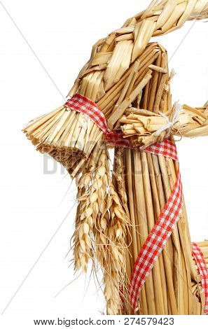 Close-up Of A Christmas Billy Goat Isolated On White.