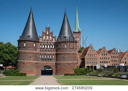 Luebeck, Germany - June 7, 2018: Historic Holsten Gate, Landmark Of The Hanseatic City Of Lübeck On 