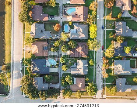 Top View Residential Dwelling Units With Swimming Pool In Fall Season Near Dallas, Texas