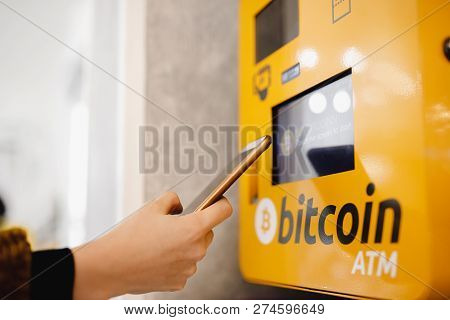 Contactless Atm Machine For Payment By Bitcoin Cryptocurrency. Concept Pay Mobile Phone.