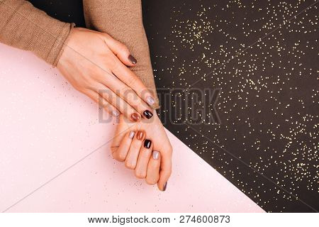 Holiday Beautiful Manicure With Golden Decorations, Festive Concept.