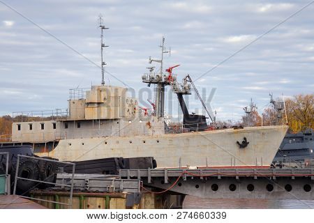 The Old Shabby Russian Minesweeper In Harbour.