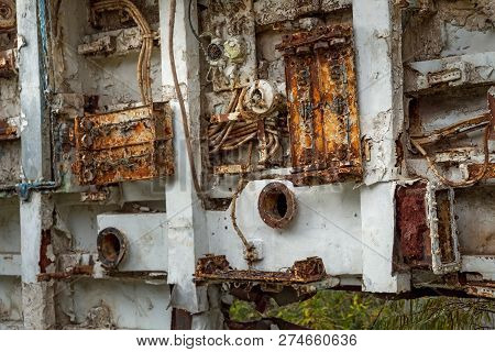 Internal Parts Of Decommissioned Marine Ship That Was Cut And Left On The Shore.