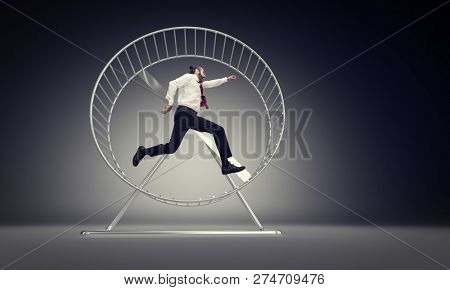 caucasian businessman run in abstract hamster wheele