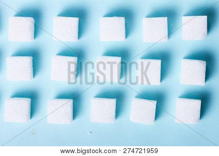 Sugar Cubes Pattern On Blue Background, Flat Lay Top View Scene