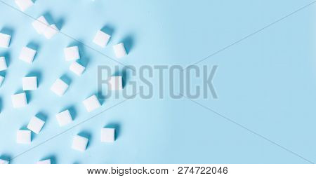 Sugar Cubes On Blue Background, Flat Lay Scene Banner With Copy Space