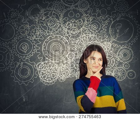 Hard Thinking Serious Smart Woman Holding Hand Under Chin Over Blackboard Background Gear Brain Arro