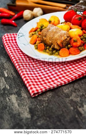 Beef meat stewed with potatoes-Traditional French cuisine Beef Bourguignon potatoes carrots in persillade