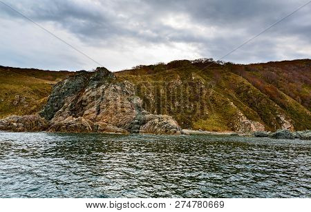 Sea Rocks In The Sea Of Japan. Island Askold. Russia.