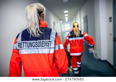 German Paramedic Runs In A Floor To An Accident