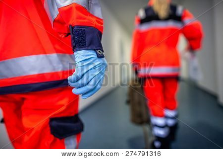 German Paramedic Runs In A Floor To An Accident