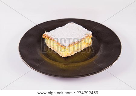 Napoleonka Cake - A Polish Type Of Cream Pie - Sprinkled With Powdered Sugar