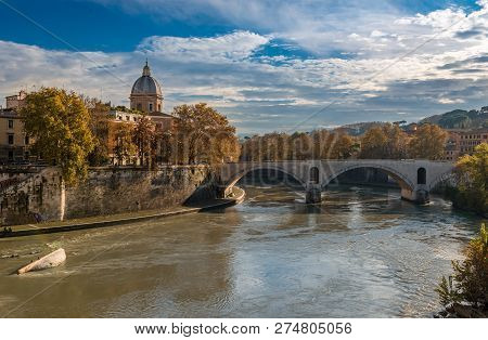View Of Ponte Principe Amedeo Savoia Aosta That Spans Riber Tiber, With The Dome Of The Museo Di Art
