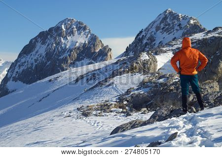 mountaineer  against Foratata peak in Tena Valley, Huesca, Pyrenees, Aragon, Spain