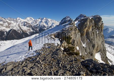 mountaineer  against Foratata peak in Tena Valley, Huesca, Pyrenees, Aragon, Spain