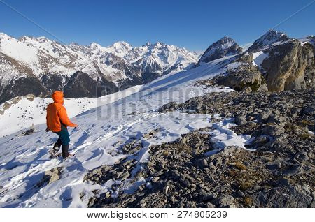 mountaineer  against Foratata peak in Tena Valley, Huesca, Pyrenees, Aragon, Spain