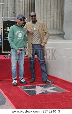 LOS ANGELES - NOV 19:  Pharrell Williams, Snoop Dogg, Calvin Broadus Jr at the Snoop Dogg Star Ceremony on the Hollywood Walk of Fame on November 19, 2018 in Los Angeles, CA