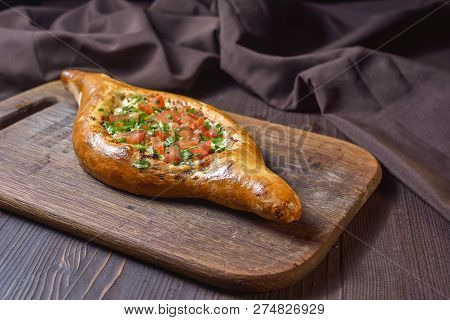 Ajarian Traditional Flatbread - Khachapuri Or Hachapuri With Meat And Vegetables And Cheese. Copy Te