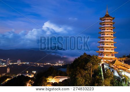 View Of The Pagoda Tower During Cloudy Blue Hour. Landscape Orientation