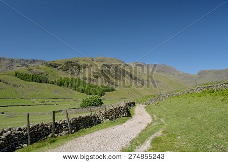 Bowfell Above The Head Of Mickleden Valley In The English Lake District