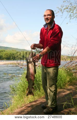 Fisherman With The Fish