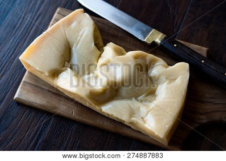 Turkish Traditional Gravyer / Gruyere Cheese From Kars On Wooden Surface