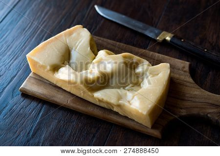 Turkish Traditional Gravyer / Gruyere Cheese From Kars On Wooden Surface