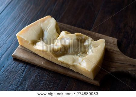 Turkish Traditional Gravyer / Gruyere Cheese From Kars On Wooden Surface
